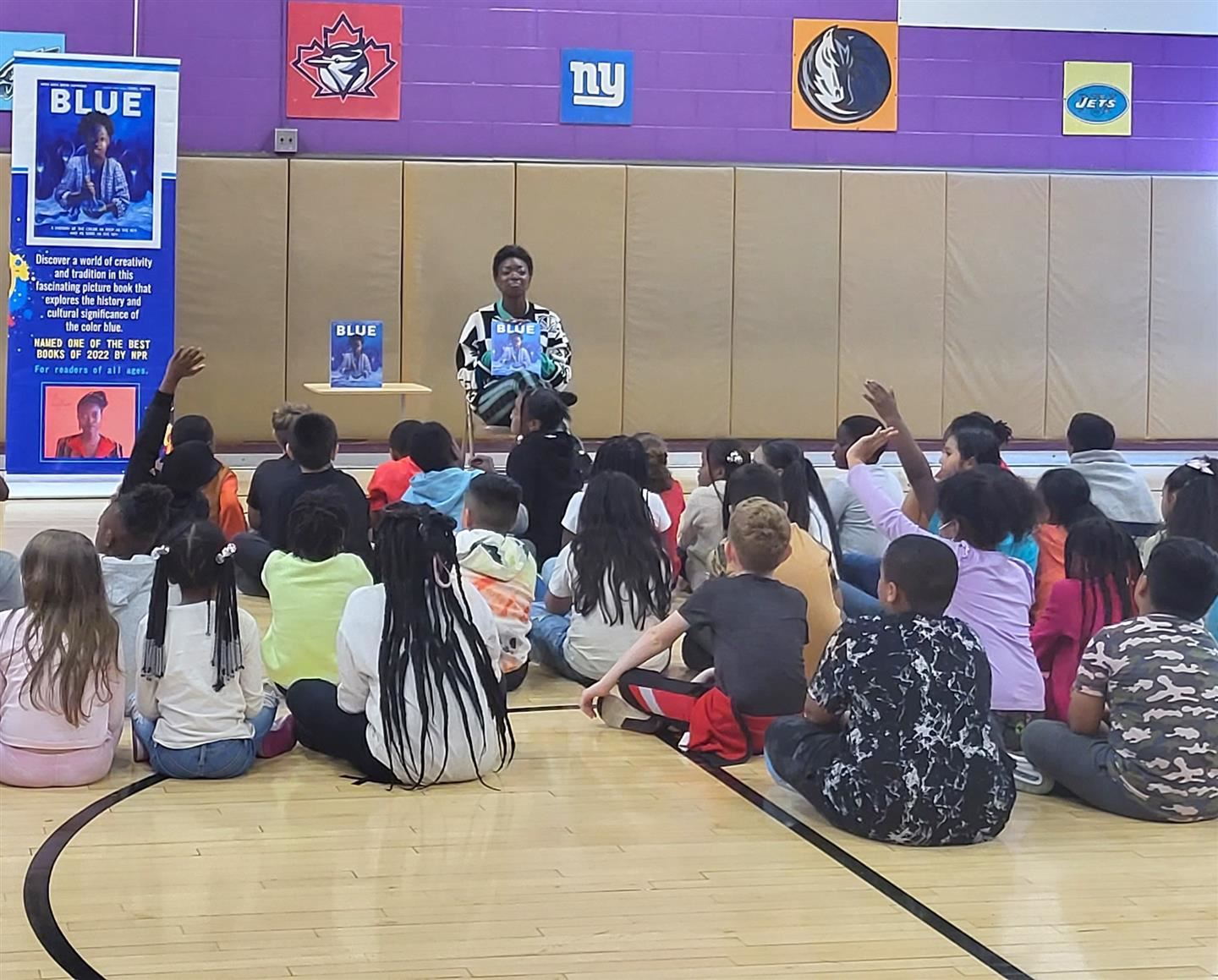  Author Nana Ekua Brew-Hammond talks about her book with students at Warring Elementary School.